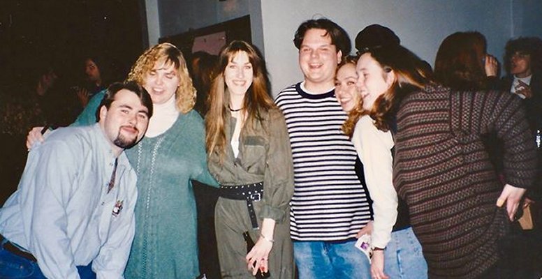 Happy Rhodes with Mike Brewer (left) and employees of Rainbow Records. 1995?